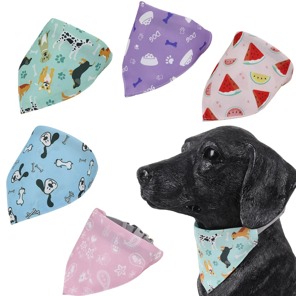 A collection of colorful cotton pet bandanas and scarves featuring various cartoon prints for dogs and cats.