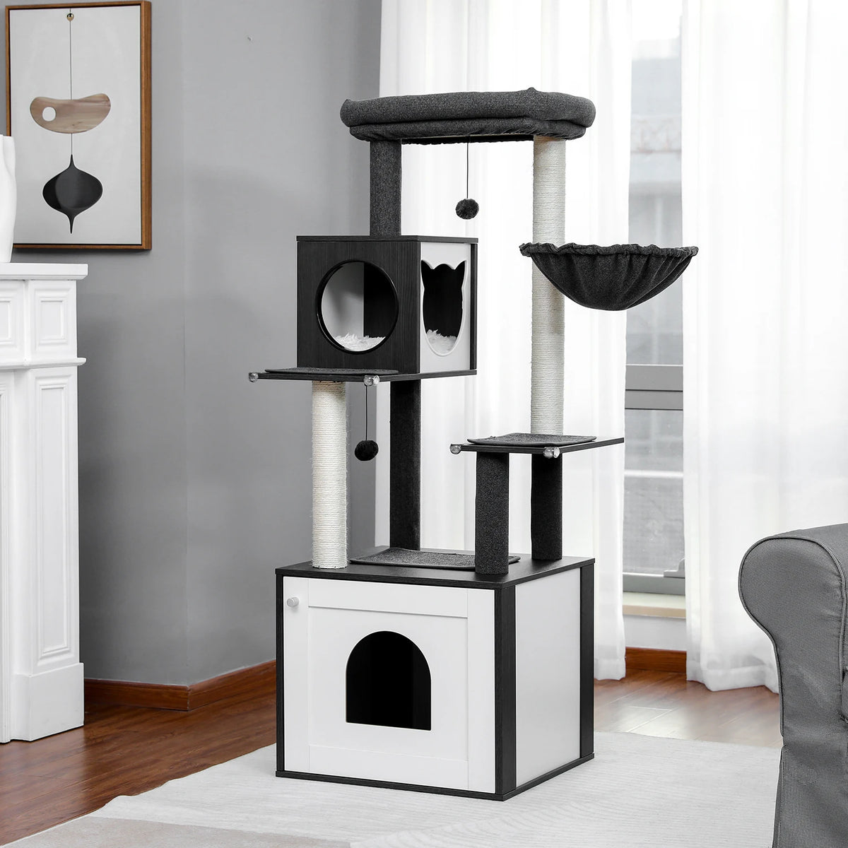 A wooden cat tower with a litter box enclosure and scratching posts, featuring black and white elements.