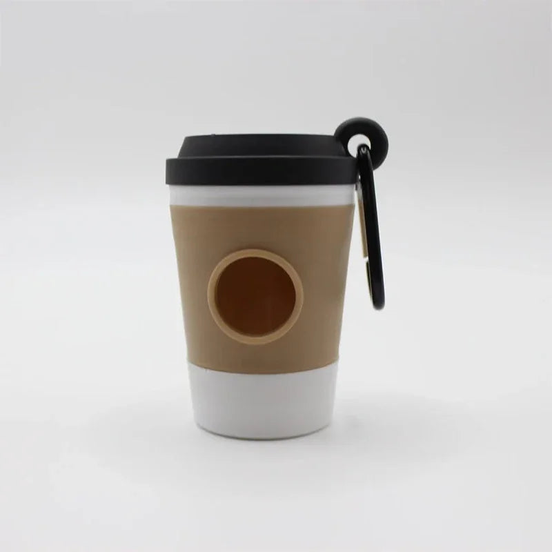 A beige and white portable pet poop trash can dispenser with a black lid and strap.