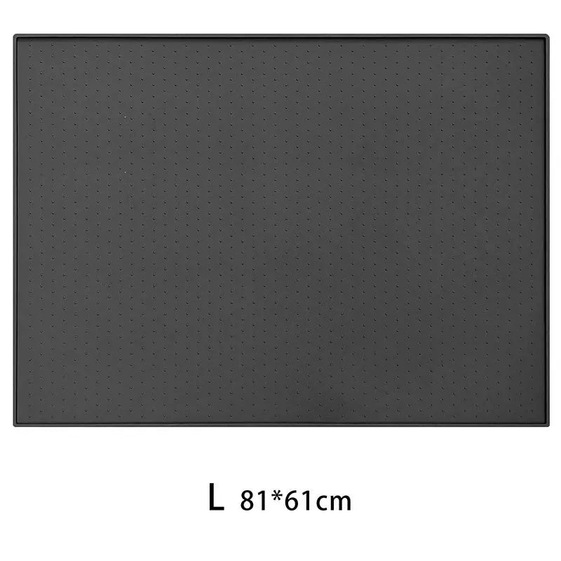 A rectangular gray silicone pet feeding mat with a non-slip surface.