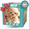 A box of a Nico Robot interactive plush puppy toy with a pink ribbon and a picture of the fluffy puppy.