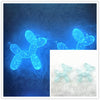 Two glowing blue acrylic balloon dog charms against a dark blue background.