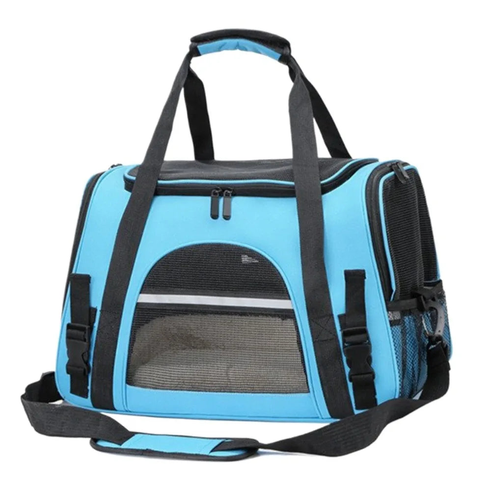 A light blue foldable pet travel carrier bag with black straps and a mesh window.