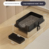 A large heightened black semi-enclosed cat litter box with a stainless steel base and litter tray shown on a wooden floor.