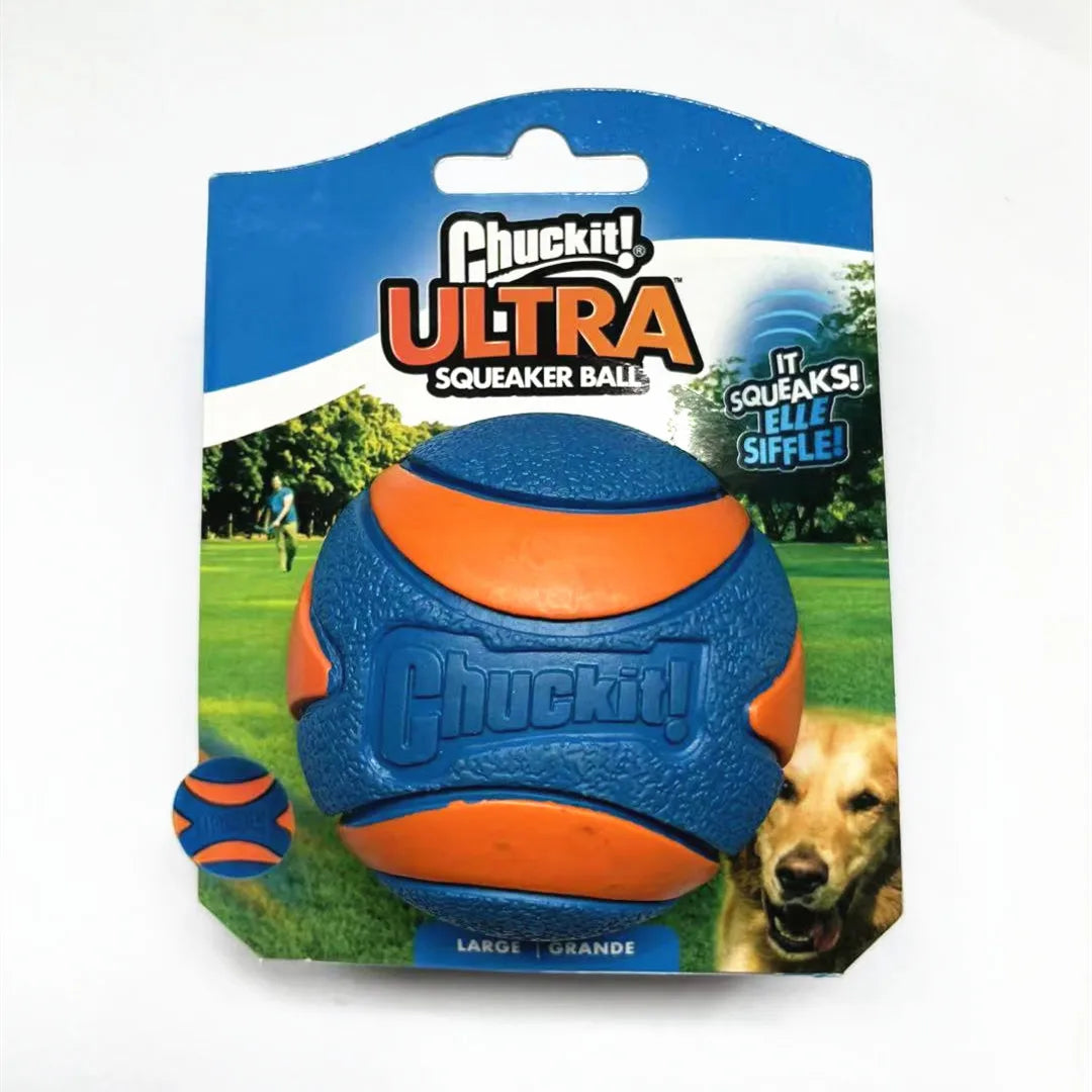 A blue and orange Chuckit Ultra squeaker ball for dogs is shown in its packaging.