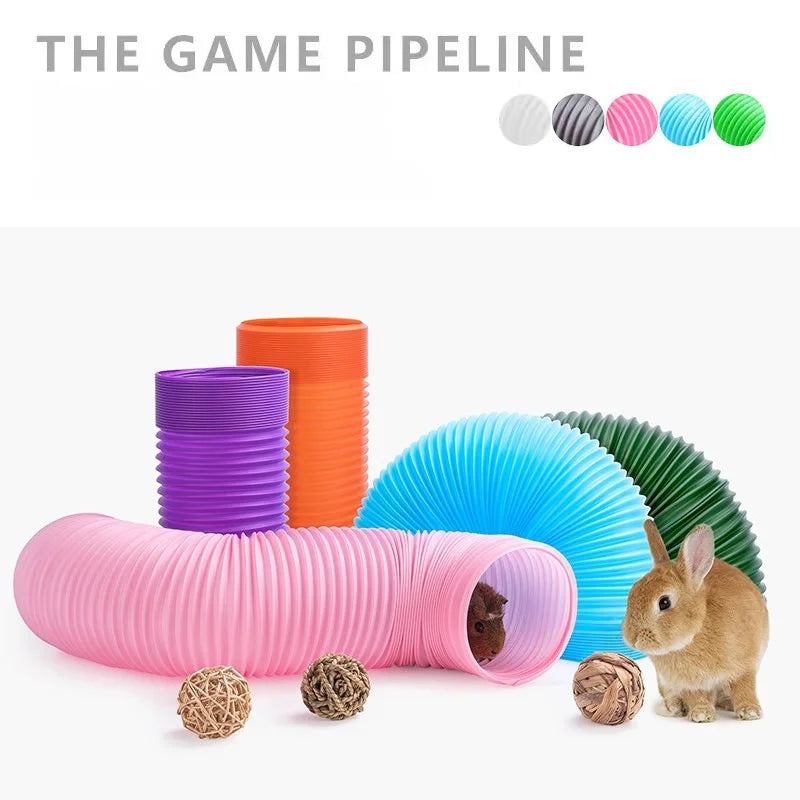 A collection of colorful plastic tunnels and a small rabbit toy are displayed on a white background.
