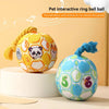 A yellow and blue pet interactive ring bell ball toy with a fluffy rope and wind chimes on a white stand.