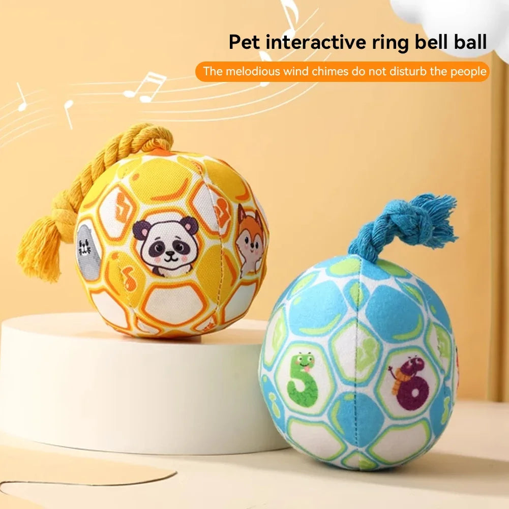 A yellow and blue pet interactive ring bell ball toy with a fluffy rope and wind chimes on a white stand.