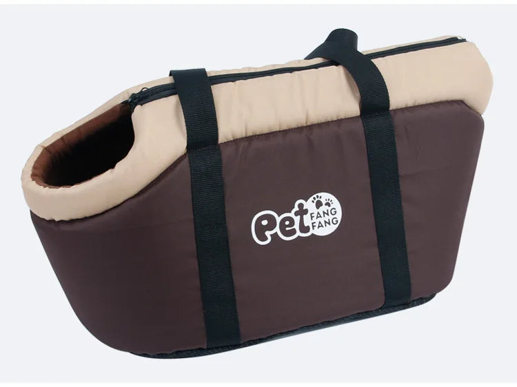 A brown and beige portable foldable pet carrier bag with a black strap and a breathable mesh window.