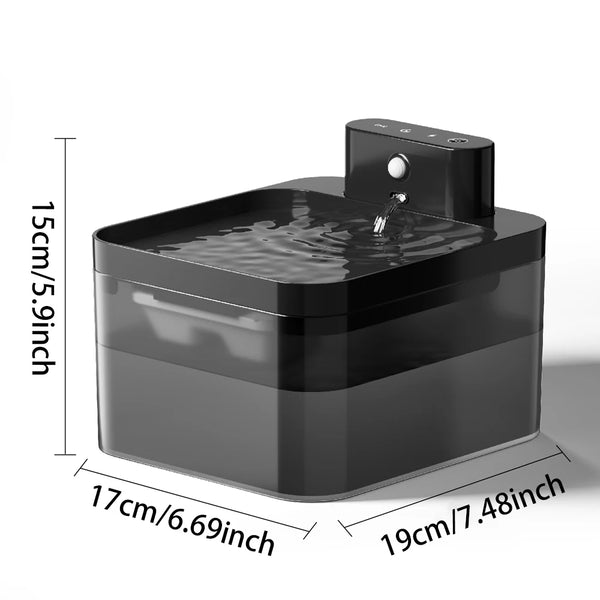 Fuente de agua automática negra para mascotas con sensor de movimiento, vista desde arriba.