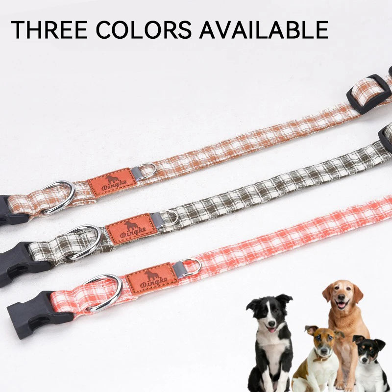 Three plaid polyester dog collars in orange and black patterns are displayed against a white background.