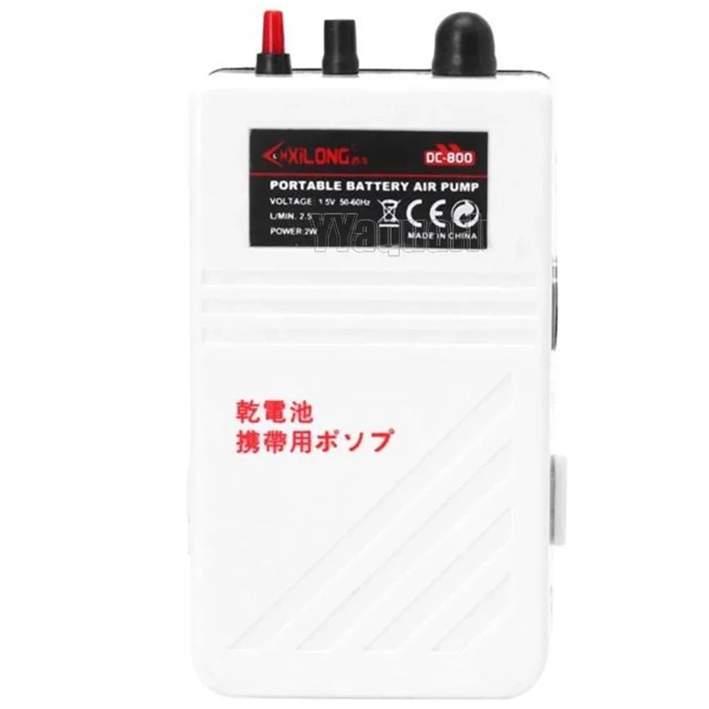 White portable battery air pump for aquarium use with black components