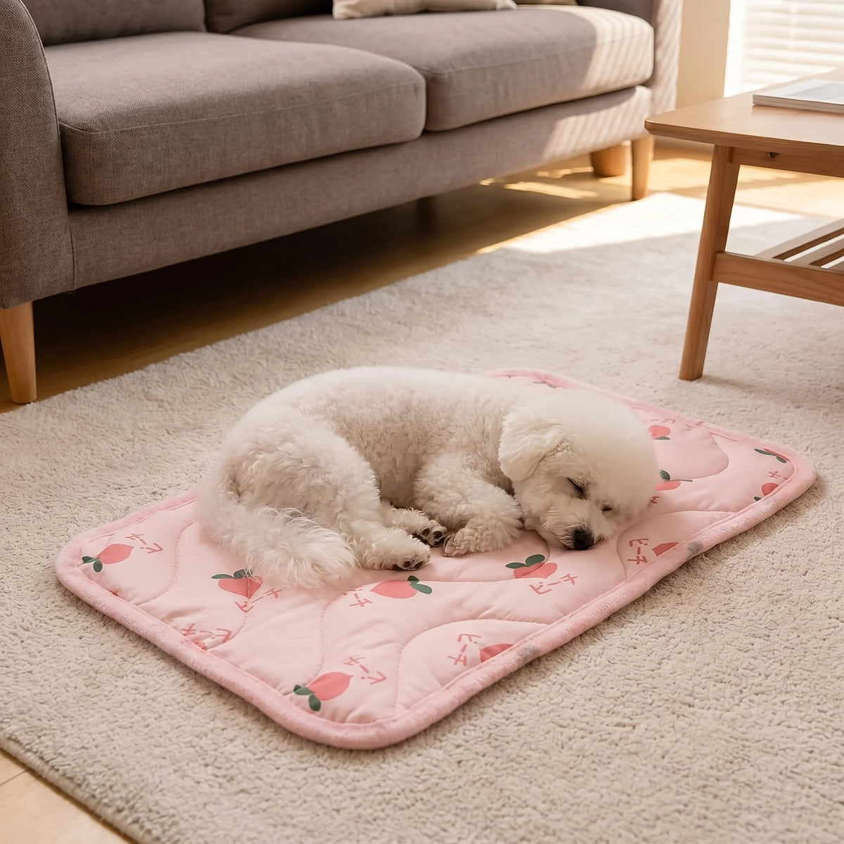 A fluffy white dog is resting on a pink self-cooling pet mat placed on a beige rug.