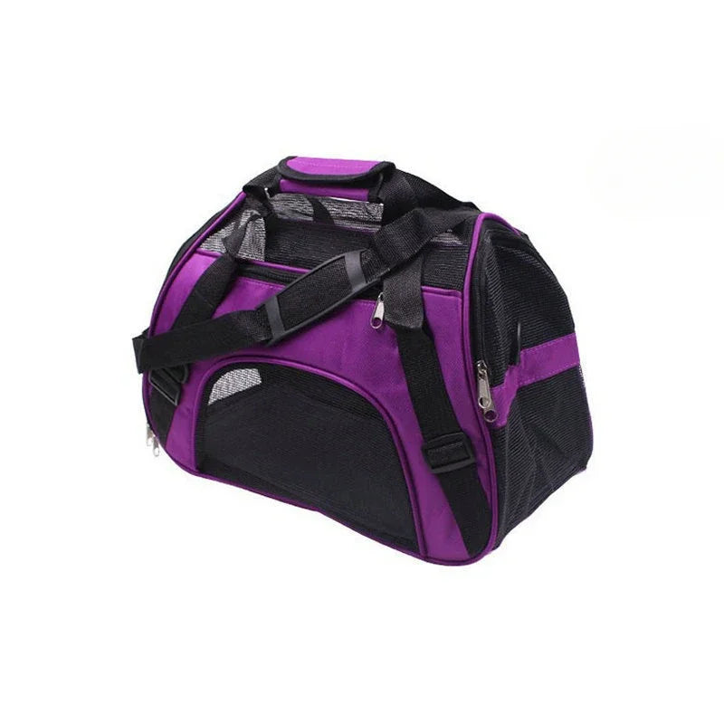 A purple and black portable foldable pet carrier for cats, dogs, and puppies.