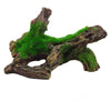 A natural wood moss root used as an aquarium decoration, featuring vibrant green moss growth.