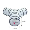 A white collapsible indoor play tunnel for cats with striped sections and a hanging ball.