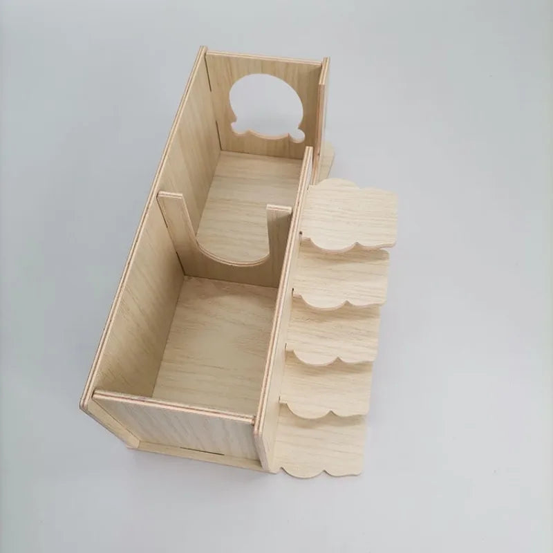 A wooden multi-room maze playhouse for hamsters with an entrance arch and stacked wooden steps.