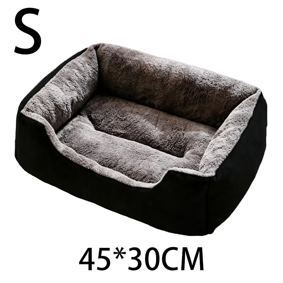 A black plush pet bed with a gray faux fur lining and anti-slip base.