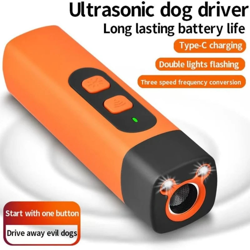 Orangefarziges Ultraschall-Hund-Führgerät mit schwarzem Gehäuse und blinkendem Licht.