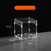 A clear acrylic reptile terrarium box shown on a dark surface with an orange indicator bar above it.