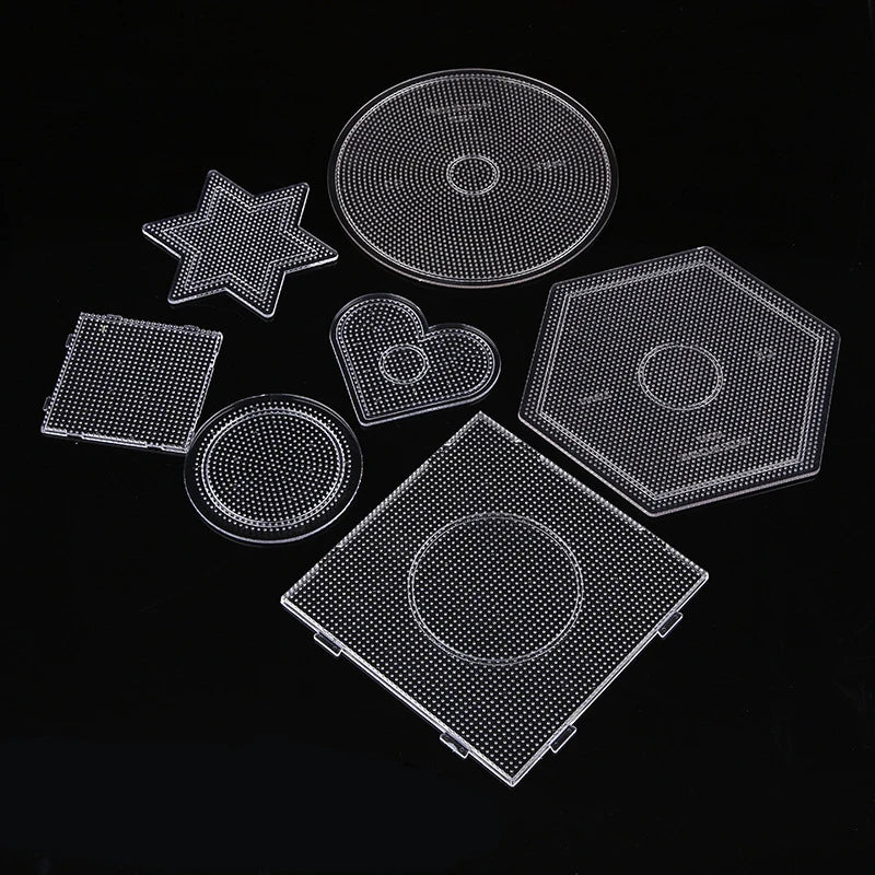 A set of precision hama beads tweezers including various shapes like stars, hearts, and hexagons on a black background.
