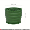 A green silicone slow feeder dog bowl with a hexagonal pattern.