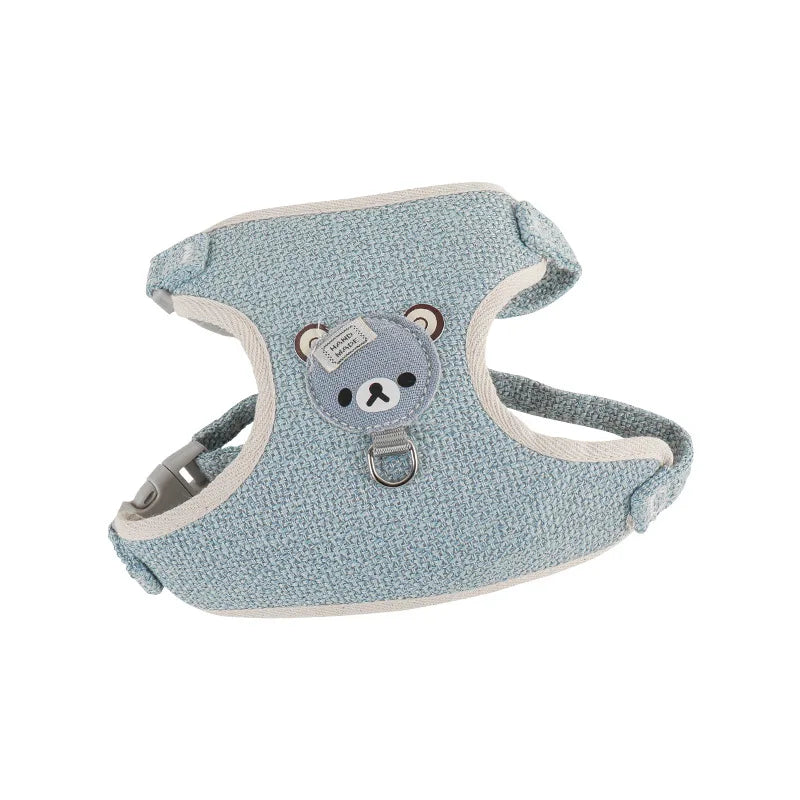Light blue nylon dog harness and leash set with a round fabric tag