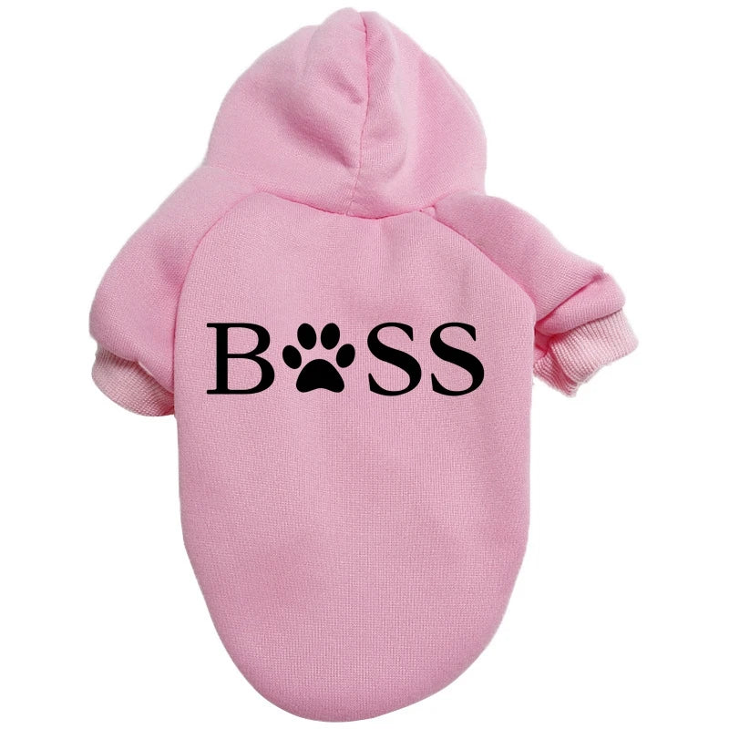 A pink cozy fleece hoodie for a small or medium dog with the word BOSS printed on the chest.