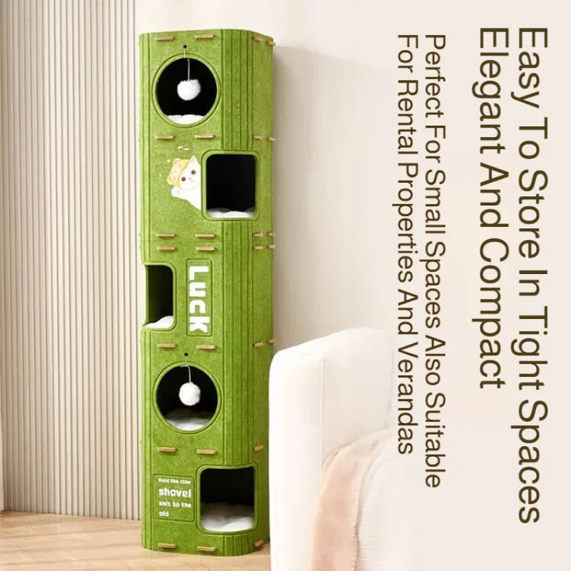 A vertical green cat house with multiple enclosed compartments and a luck sign mounted on the front.