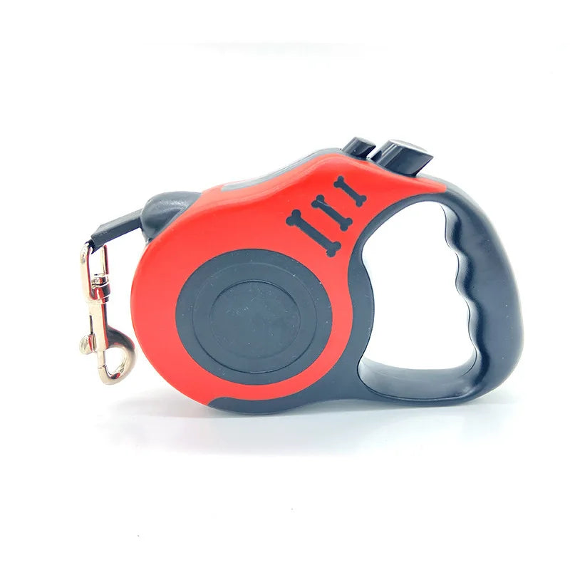 An automatic retractable dog leash in red and black is shown against a white background.