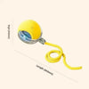 Yellow smart self-rolling cat ball toy with a flexible yellow cord and a clear obstacle avoidance sensor.