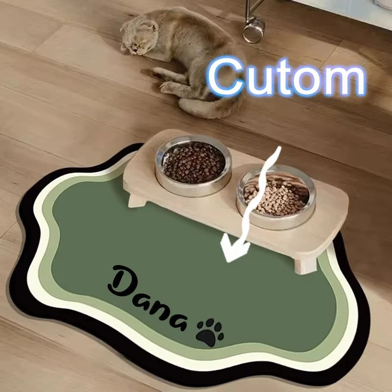 A pet feeding mat featuring a cute cat and a dog paw print, designed for feeding seeds or dry food.