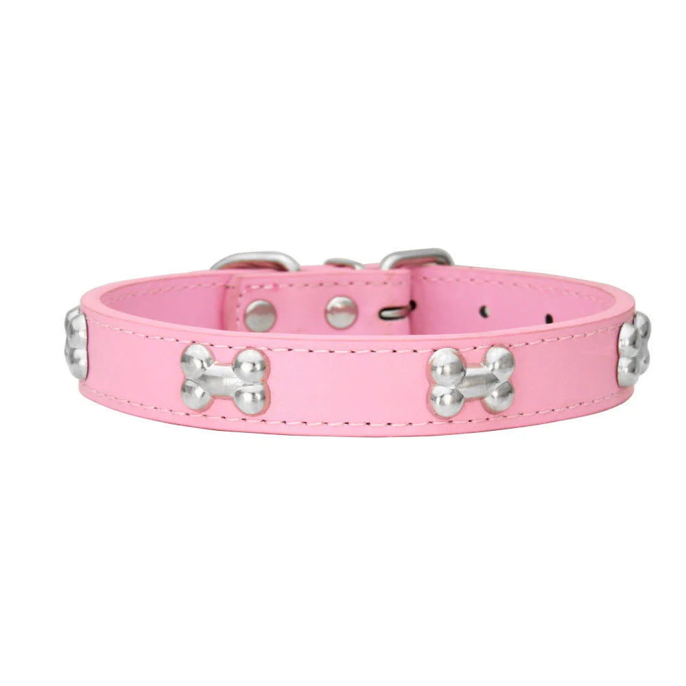 Pink padded leather dog collar with silver bone rivets for a small to large dog