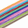 A colorful ball necklace set featuring strands of gold and silver-plated beads in various shades.