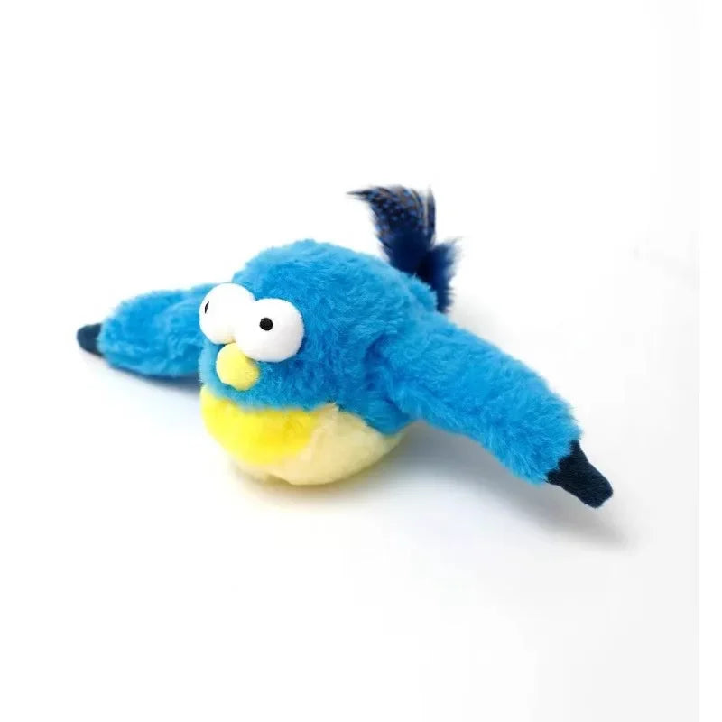 A fluffy blue cat toy resembling a bird with dark feathers and large eyes.
