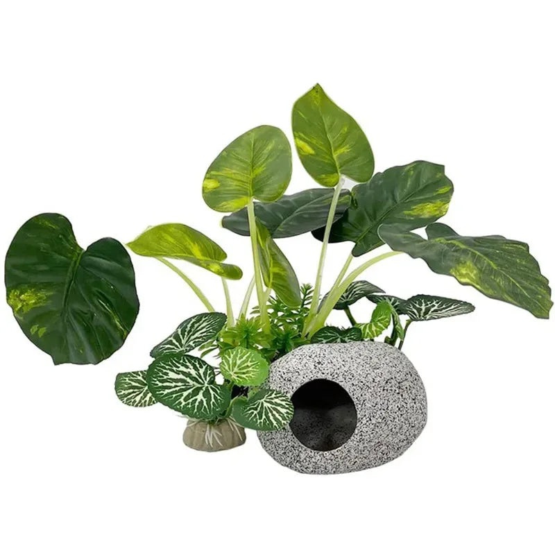 A set of realistic plastic plants with secure bases for aquarium landscaping.