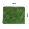 A rectangular green artificial dog grass mat used for potty training, measuring 58cm by 46cm.