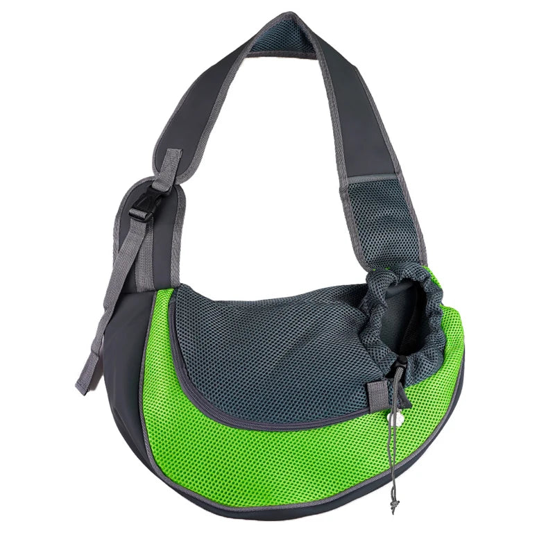A breathable mesh pet carrier sling in black and lime green.