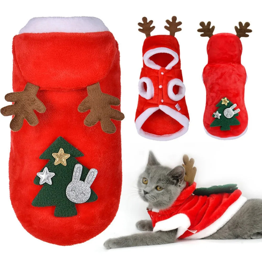 A red fleece dog sweater featuring deer antlers and a green Christmas tree design.