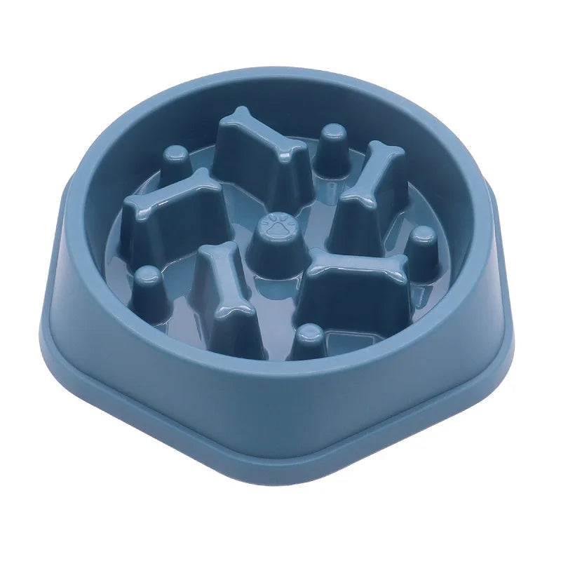 A light blue slow feeder dog bowl with an anti-slip base, featuring raised, textured compartments for food.
