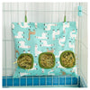A light blue fabric bag filled with hay, designed as a multi-hole feeder for small animals.