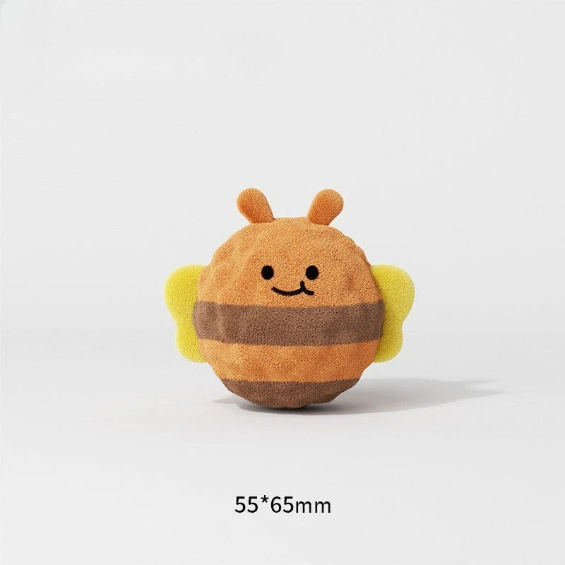 An adorable, fluffy, spiky ball dog chew toy shaped like a bee with yellow accents.