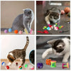 Assorted cat toys including mice, balls, and rings for feline fun