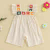 A light pink floral embroidery toddler romper for girls with ruffled sleeves and decorative trim.