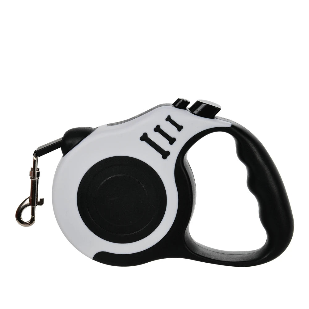 A black and white automatic retractable dog leash with a handle and clip.