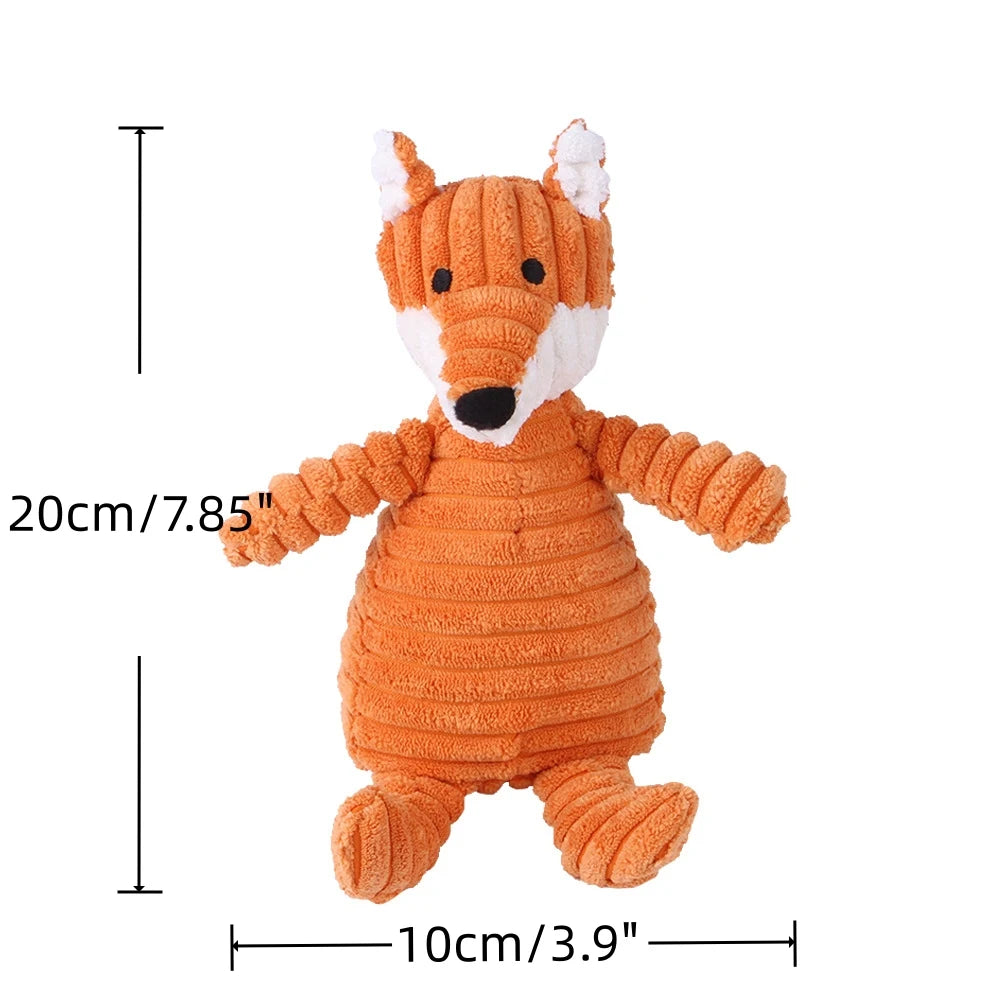 An orange animal-shaped squeaky dog toy with a corduroy cover resembling a fox.
