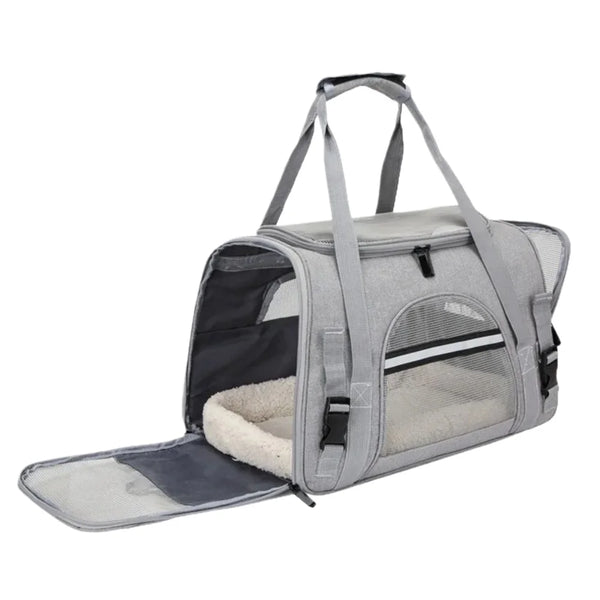A light gray foldable pet travel carrier bag with a mesh window and carrying handles.
