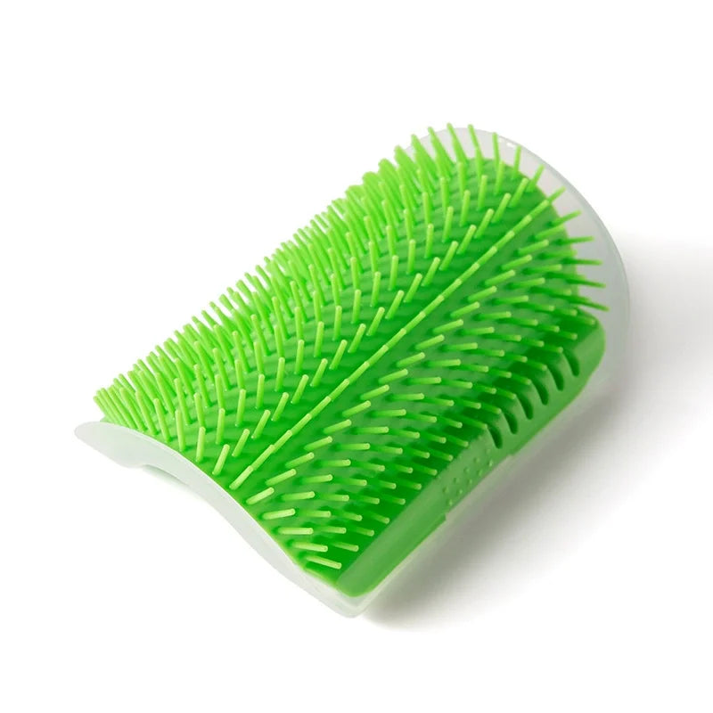 A bright green cat self-grooming massage comb with a corner mount, shown from above.