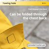 A yellow dog raincoat is shown folded through the chest, highlighting a concealed traction port.