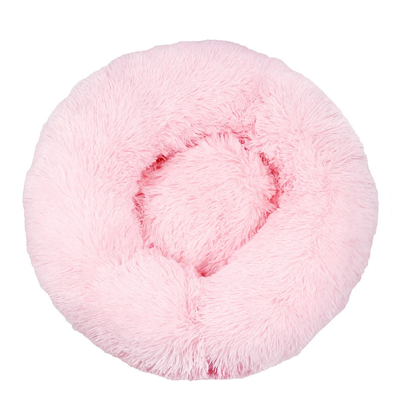 Round pink plush pet bed for dogs and cats
